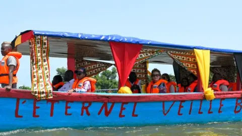 PHILIP REYNAERS/GETTY IMAGES Queen Mathilde of Belgium visits Grand-Lahou and its cemetery. Meeting with the local fishing communities threatened by the rising sea levels pictured on March 05, 2024 in Grand-Lahou, Cote D'ivoire