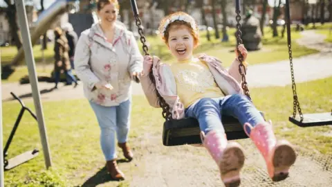 Getty Images Child on swing