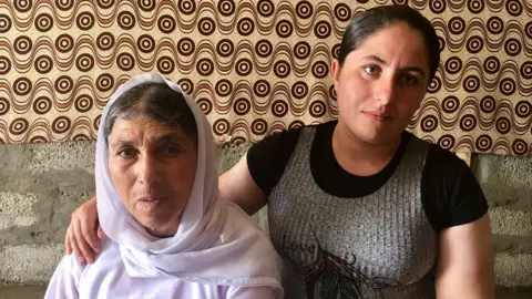 Yolande Knell Shireen and her grandmother Huri in their tent in Khanke Camp