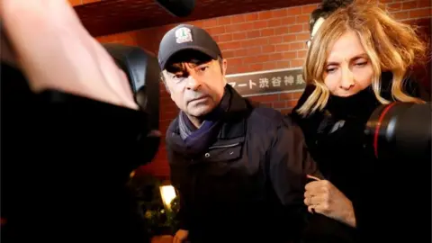 Reuters Carlos and Carole Ghosn