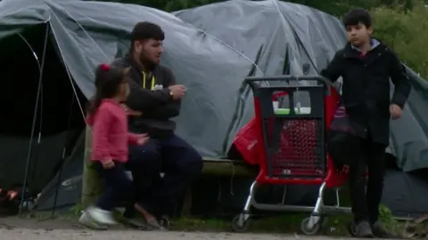 BBC Migrants at Puythouck camp, northern France