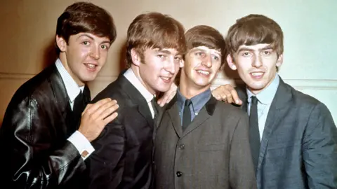 Getty Images The Beatles pose for a portrait in circa 1964