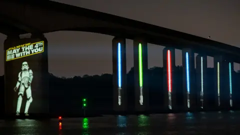 Motion Mapping A Stormtropper and lightsabers projected onto Orwell Bridge, Suffolk