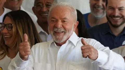 Reuters Brazil's former President and presidential candidate Luiz Inacio Lula da Silva reacts as he holds a news conference after casting his vote during the presidential election, in Sao Bernardo do Campo, on the outskirts of Sao Paulo, Brazil October 30, 2022