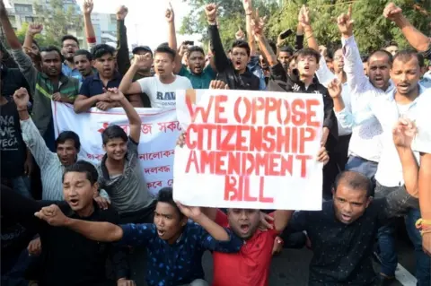 EPA Students shout slogans during a protest against the Citizenship Amendment Bill (CAB) in Guwahati, Assam, India, 11 December 2019