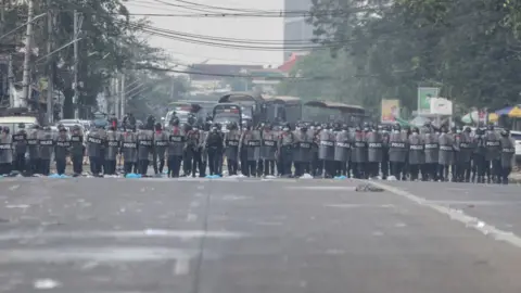 Getty Images Riot police in Yangon