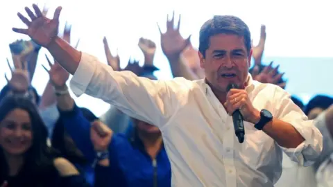 Reuters Mr Hernández celebrating with supporters on November 26