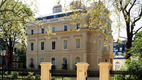 Press Association Looking over a fence at a large house