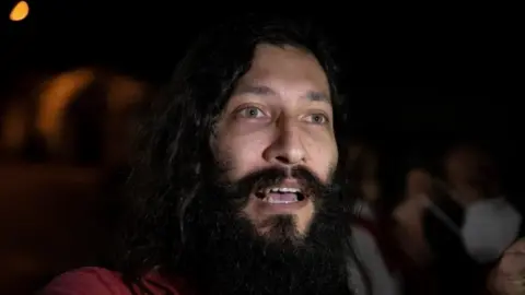 EPA Opposition lawmaker Renzo Prieto (C) speaks to the media after being released, at the headquarters of the Special Actions Forces of the Bolivarian National Police, in Caracas, Venezuela, 31 August 2020