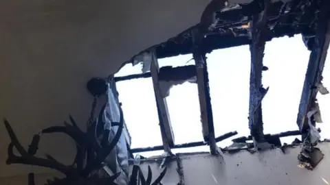 BBC Damage caused to the roof of a house in Wrexham