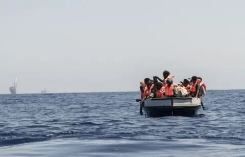 Valeria Ferraro/Getty People on a boat in the Mediterranean.