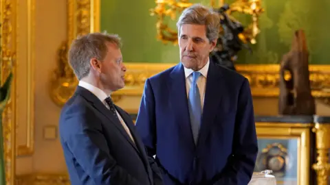 Photoshot US Climate Envoy John Kerry and UK Energy Security and Net Zero Secretary Grant Shapps