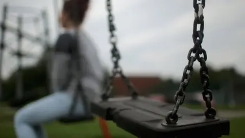 Getty Images A child on a swing