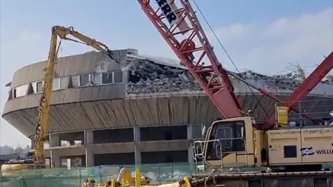 Diggers work on demolition of Fawley power station control room