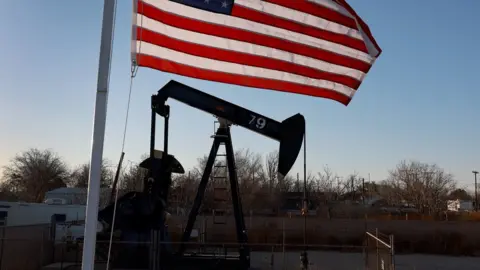 Getty Images An oil pumpjack setup in a residential neighborhood pulls oil from the Permian Basin oil field on March 13, 2022 in Odessa, Texas.