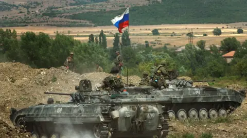 Getty Images Russian tanks take positions near the village of Igoeti in Georgia