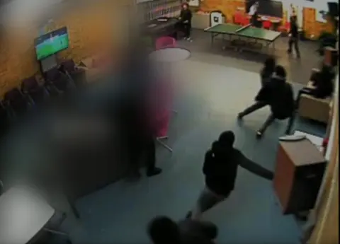 Metropolitan Police Teenagers flee through youth club