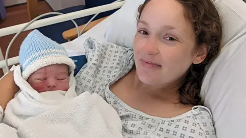 Hollie Nolan  Mum with her baby boy after birth