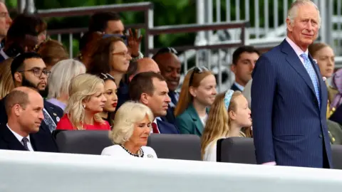 Reuters Prince Charles, Camilla, Duchess of Cornwall, and Prince William attend the Platinum Jubilee Pageant