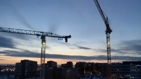 BBC cranes in twilight