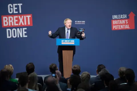 PA Media Boris Johnson has launched his party's manifesto