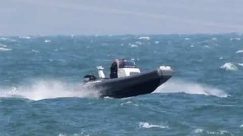 Wellington School Harry Besley on the high seas in a rib