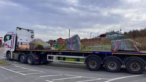 Martin Giles/BBC Lorry with granite rocks