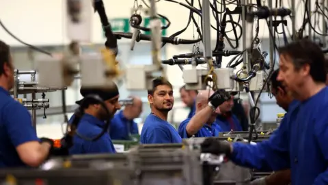 Getty Images Factory workers