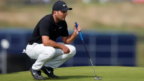 Reuters Francesco Molinari assesses a shot at Royal Portrush