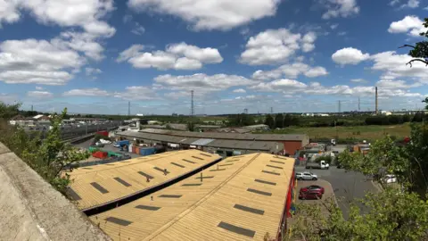 BBC An industrial estate in the Swanscombe Peninsula in north Kent where the London Resort will one day reside