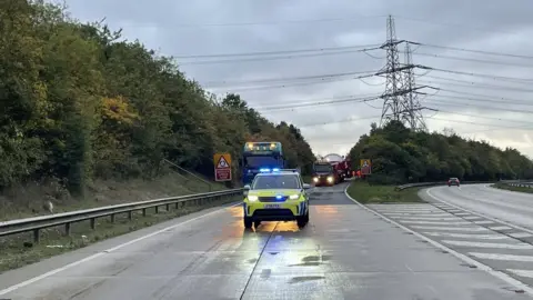 Suffolk Highways Police in front of lorry