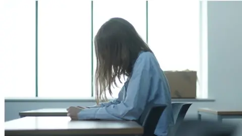 BBC Panorama  Girl sitting at school desk