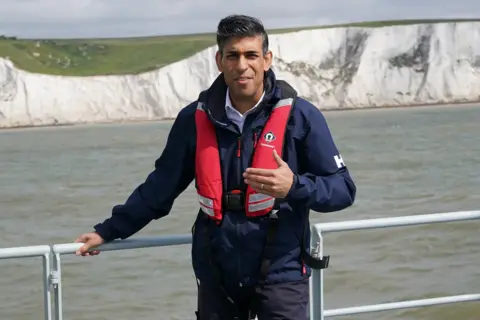 Reuters A picture of Rishi Sunak on a boat during a visit to Dover