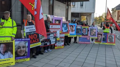 Peter Walker/BBC Mental health campaigners outside Essex coroner's court