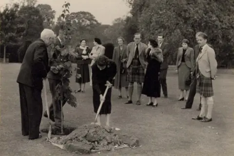 Glamis Castle Queen planting a tree at Glamis Castle in 1953