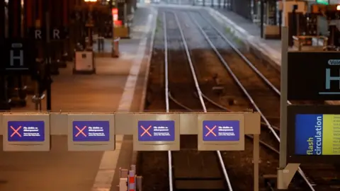 Reuters Empty tracks are seen at the Gare de Lyon railway station in Paris as a strike by French SNCF railway workers and French transportation workers continues on 6 December, 2019.