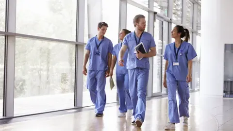 Getty Images Doctors in scrubs