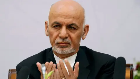 Reuters Afghan President Ashraf Ghani prays during a peace and security cooperation conference in Kabul, Afghanistan 6 June 2017
