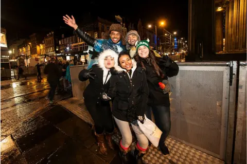 Getty Images Revellers at Edinburgh's Hogmanay street party