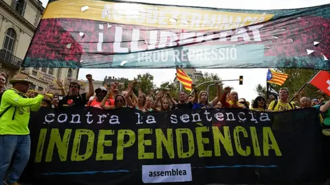 Getty Images Protesters take part in a general strike on October 18, 2019 in Barcelona, Spain