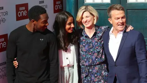 PA Whittaker with co-stars Tosin Cole, Mandip Gill and Bradley Walsh