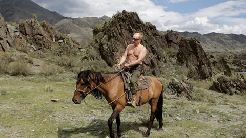 AFP Russian Prime Minister Vladimir Putin rides a horse during his vacation outside the town of Kyzyl in Southern Siberia on August 3, 2009