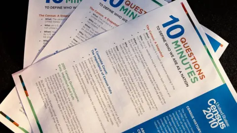 Getty Images Forms for Census 2010 are displayed during an event to promote the census at Ben's Chili Bowl in Washington, DC on 1 April 2010