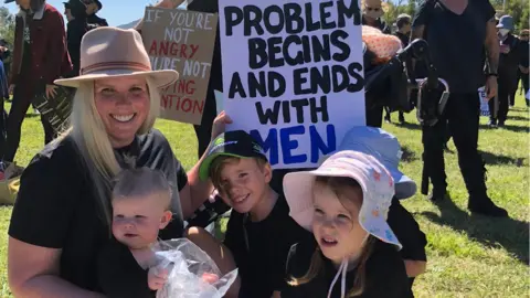 BBC NEWS Jade Catton and her children at the Canberra March4Justice protest