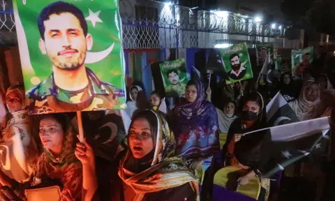 EPA People attend a candlelight vigil as the country observes 'Pakistan Martyrs Day', to honour the soldiers and security forces who were killed in the line of duty, in Quetta, Pakistan, 25 May 2023 Photo by FAYYAZ AHMAD/EPA