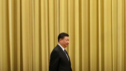 Getty Images Chinese President Xi Jinping arrives for an event to commemorate the 40th anniversary of the Message to Compatriots in Taiwan at the Great Hall of the People January 2, 2019 in Beijing, China