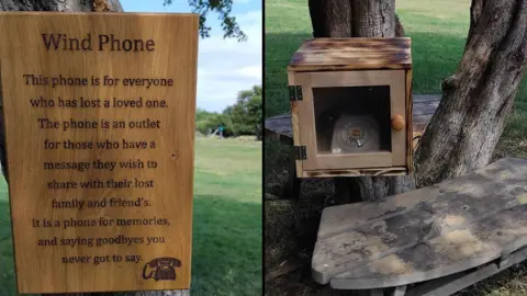 The Pilgrim Shed A composite photo of two images. On the left is a grey plaque which says "Wind phone: This phone is for everyone who has lost a loved one. The phone is an outlet for those who have a message they wish to share with their lost family and friends. It is a phone for memories, and saying goodbyes you never got to say." On the right is a wooden box with a cream dial phone holder inside it, next to a tree and a wooden bench.