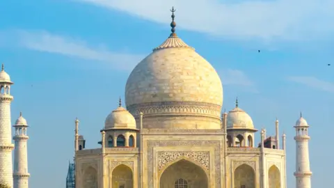 The Taj Mahal against a blue sky