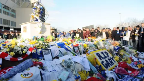 Getty Images Tributes to Gary Speed laid outside Leeds United ground after his death in 2011