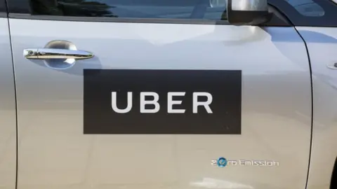 Reuters Uber logo on a car